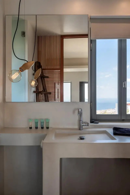 West East Suites Hotel - Chambres