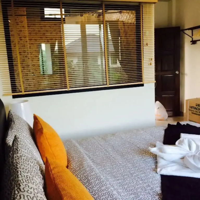 Montra Nakhon Guesthouse - Chambres
