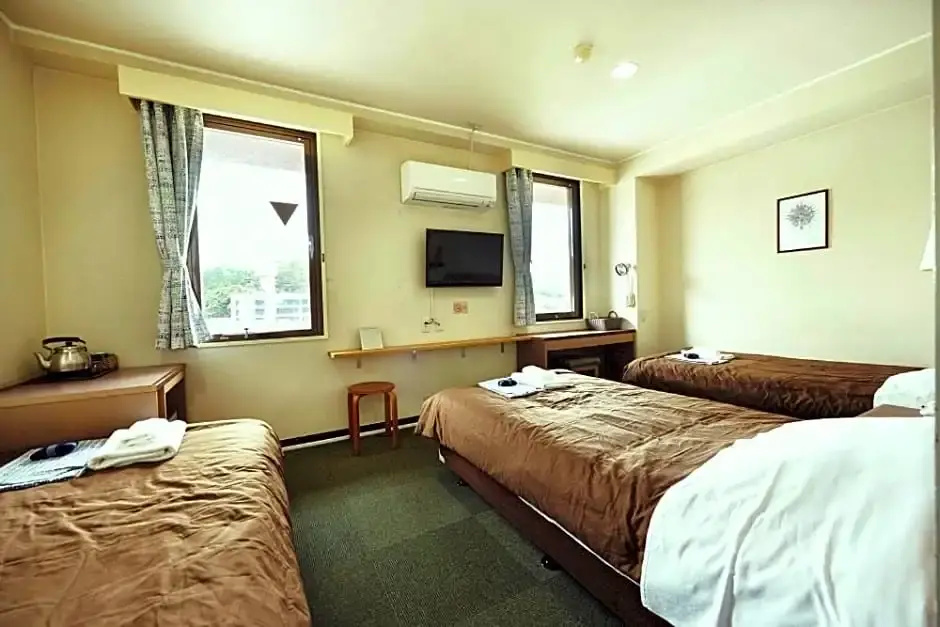 Sansui Global Inn - Chambres