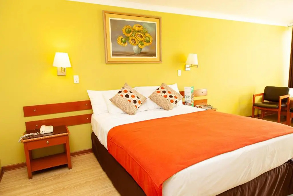 Hotel Holiday Suites - Chambres