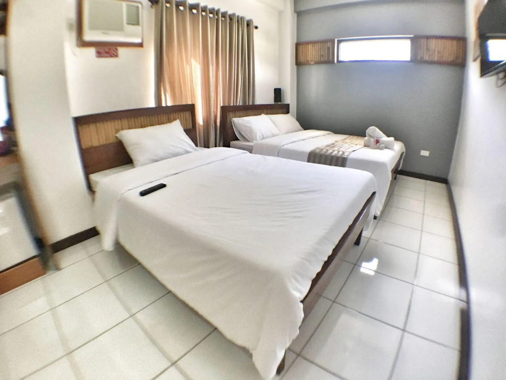 Ark Bayz Suites - Chambres