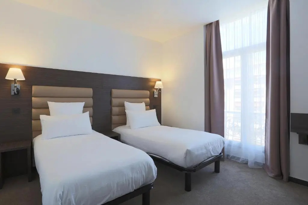 Hôtel & Appartements Monsigny - Chambres