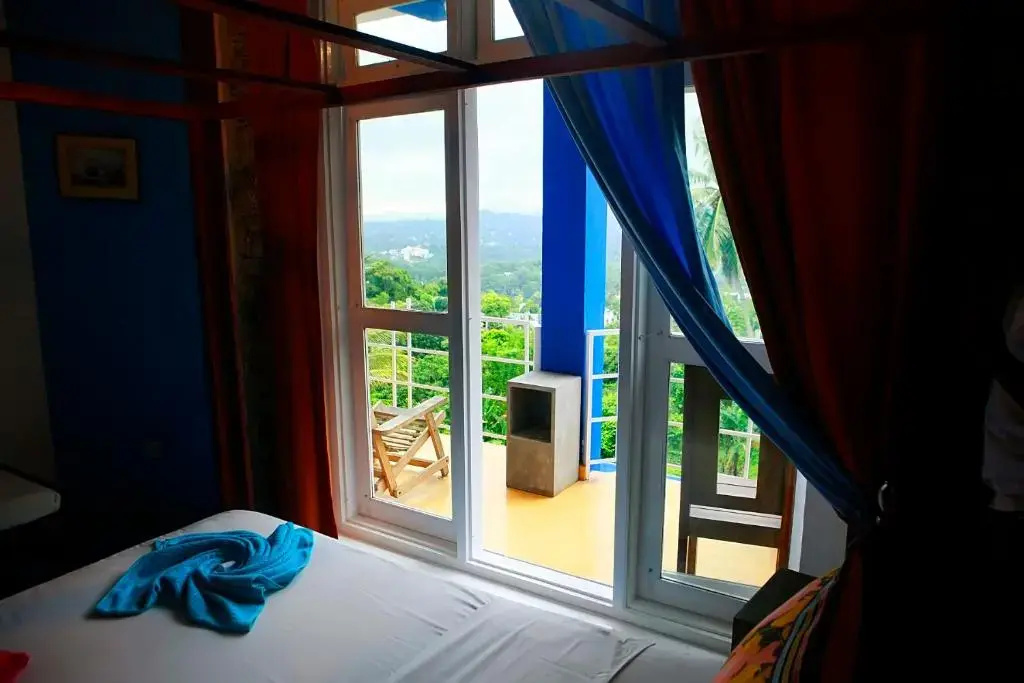 Standard Triple room with garden view