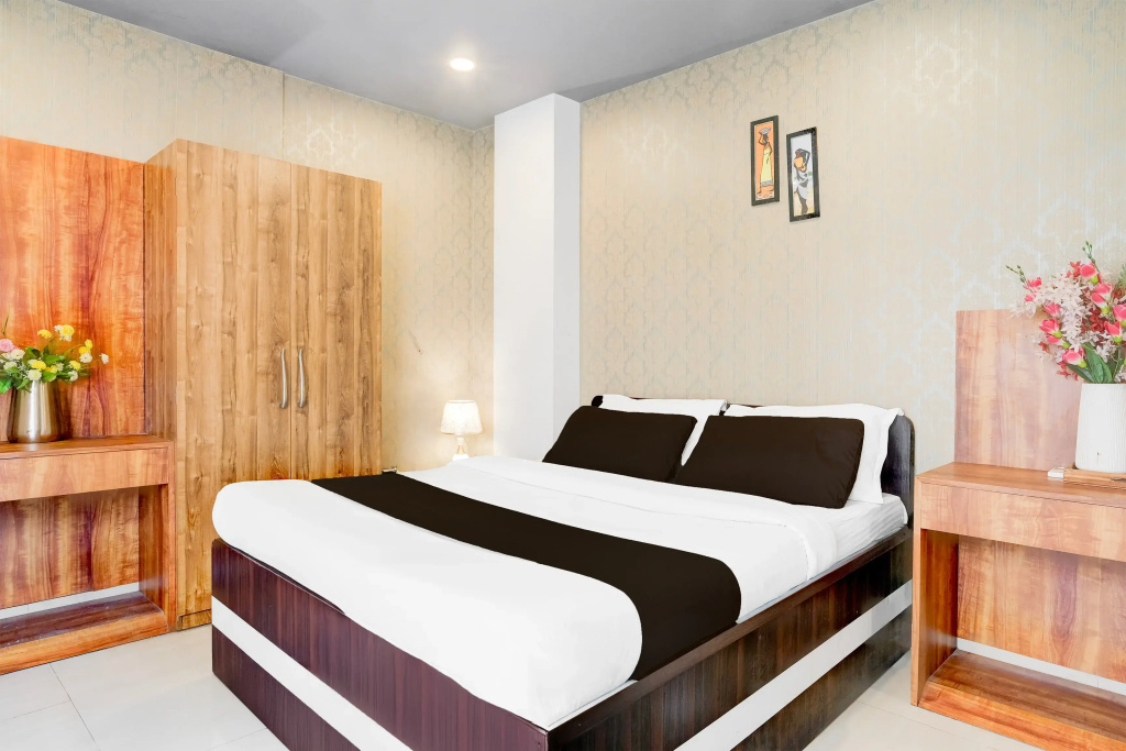 OYO Premium Beltola Tiniali - Chambres
