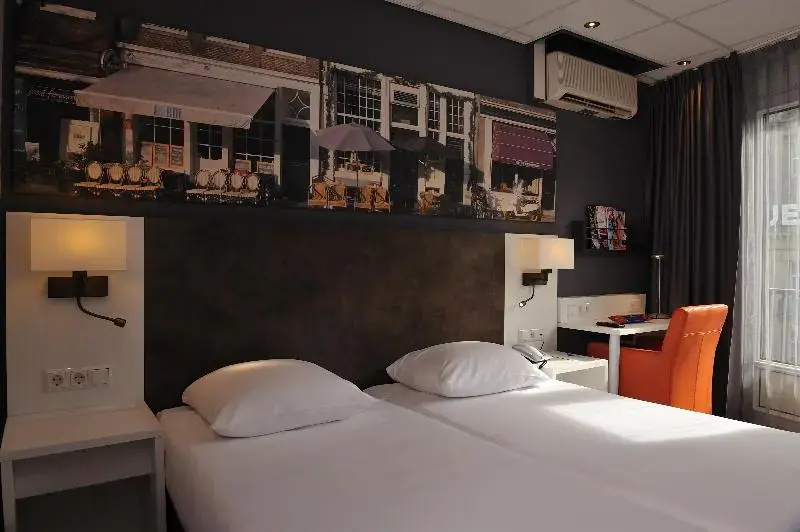 Hotel Amsterdam De Roode Leeuw - Chambres