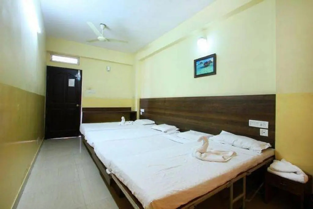Suvarna Residency - Chambres