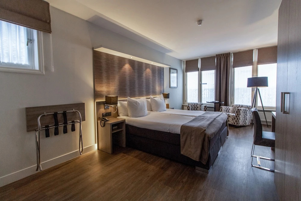 Grand Hotel en Résidence De Draak - Chambres