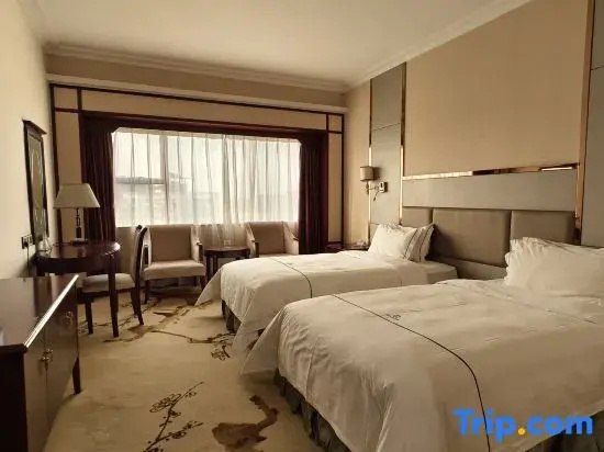 Junyi Hotel - Chambres