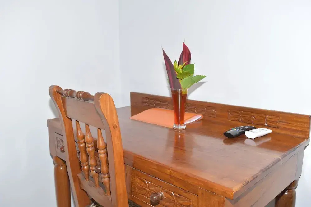 Chukwani Executive Inn - Chambres