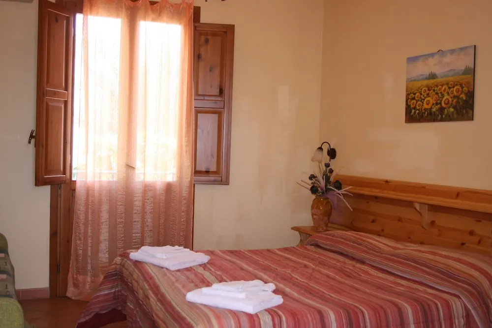 Hotel & Residence Il Cortile - Chambres