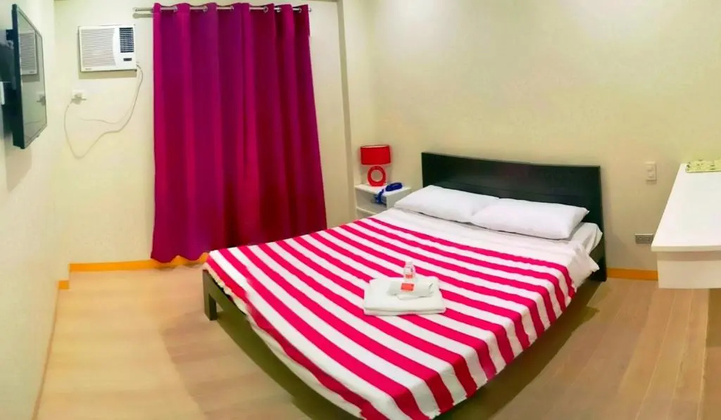 Hotel Aroha - Chambres