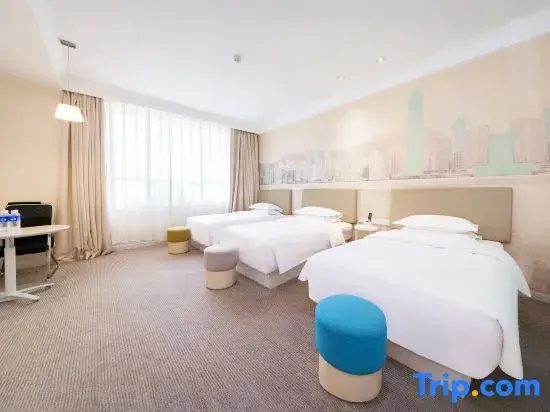 Tian Long Hotel - Chambres