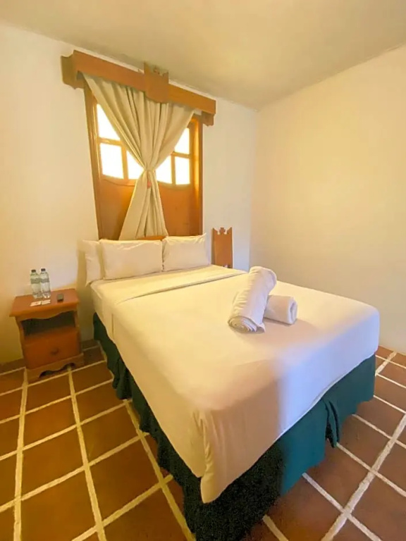 El Carmen Suites - Chambres