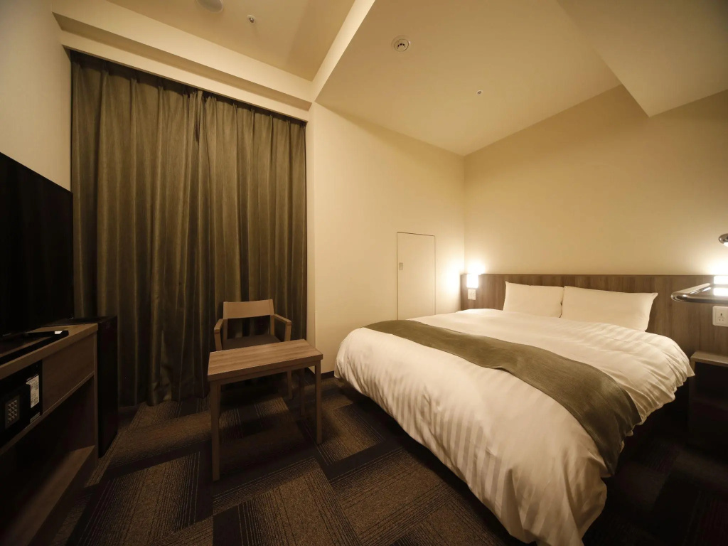 Отель Dormy Inn Korakuen Hot Springs в Токио