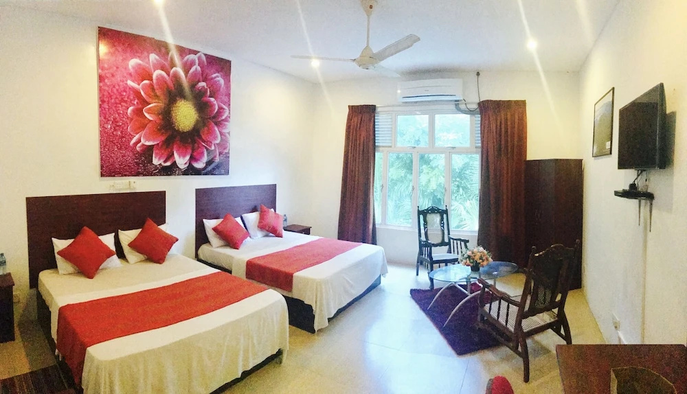 Palm Grove Holiday Inn - Chambres