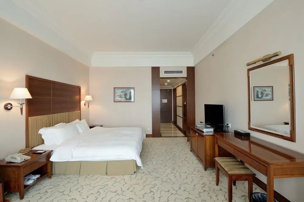 Gladden Hotel Shilong - Chambres