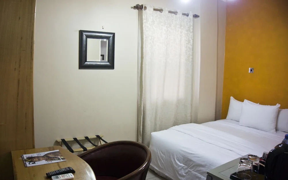 Tropical Enclave Hotel - Chambres