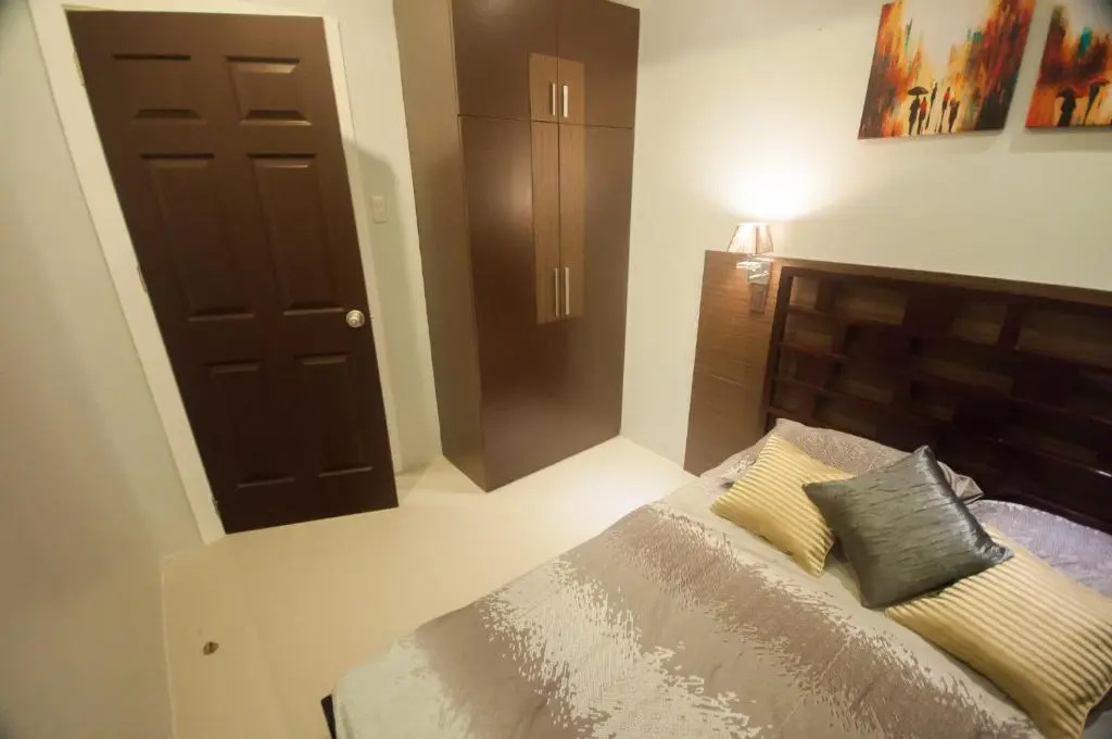 NF Suites - Chambres