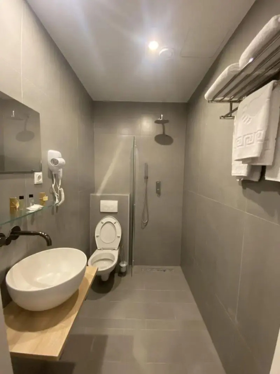 Deluxe Triple room with balcony