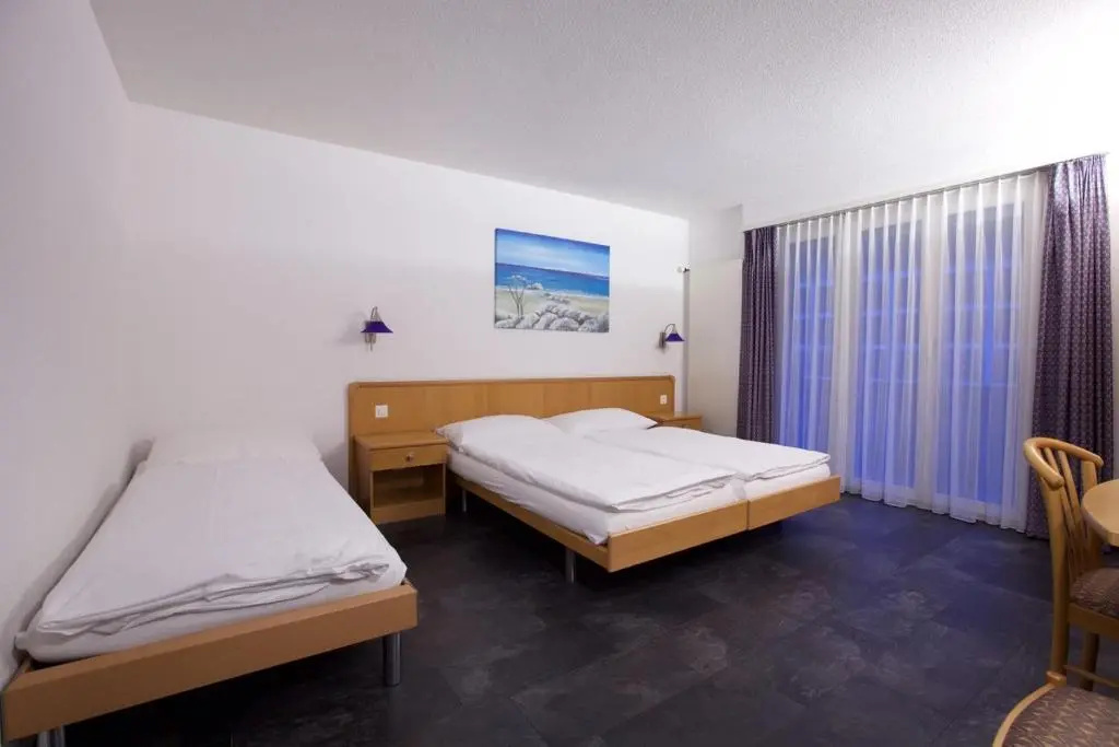 Hotel Europe Garni - Chambres