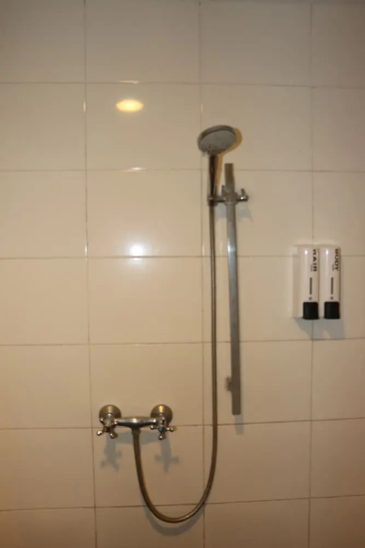 Yixin Business Hotel - Chambres