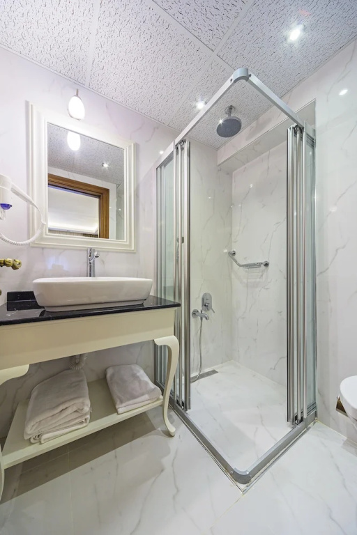 Spectra Hotel - Chambres