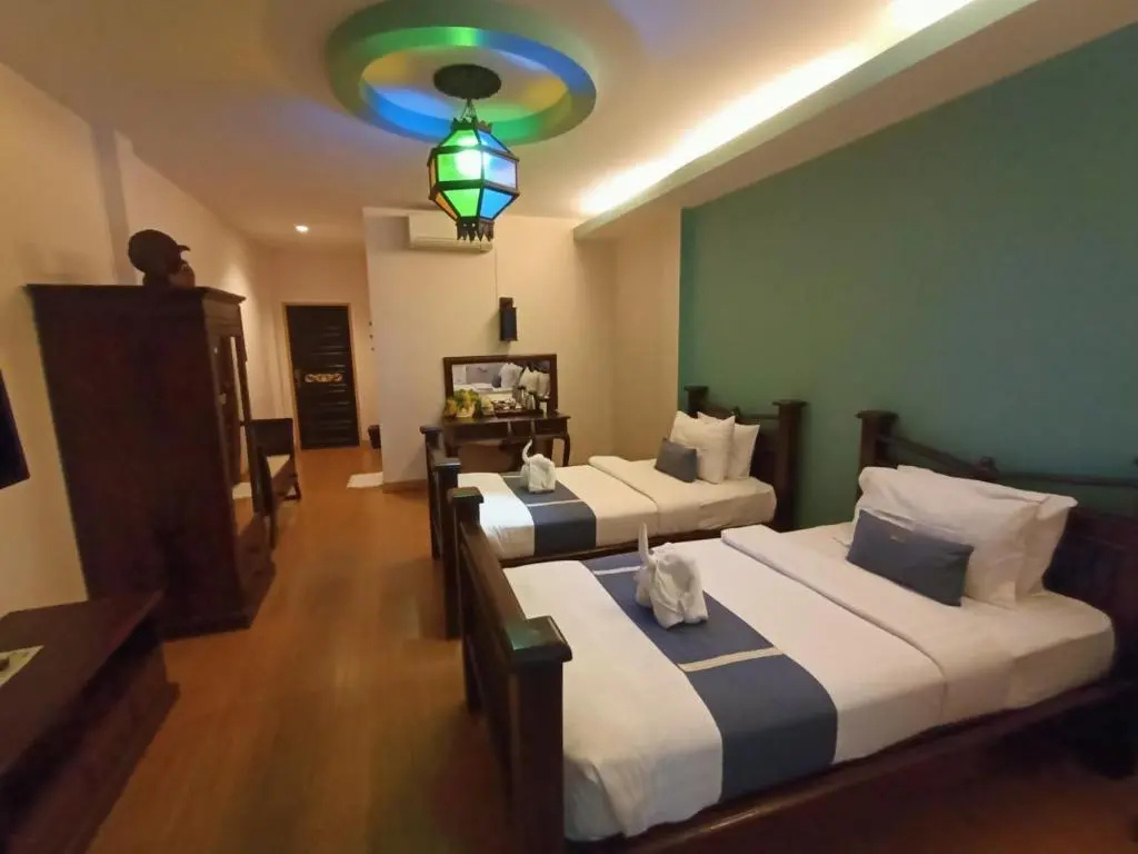 P Paradise Hotel - Chambres