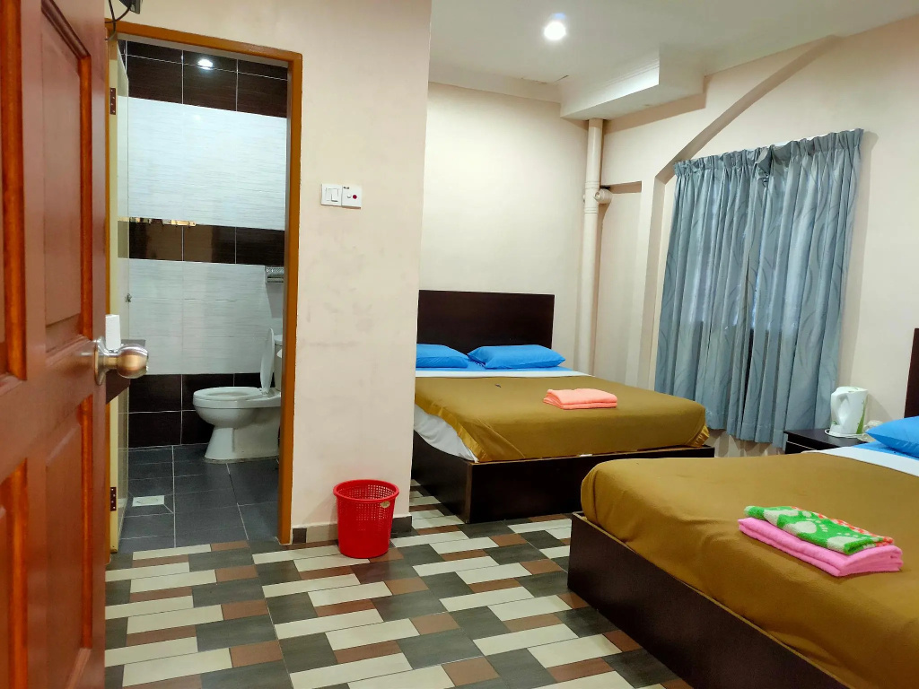 Ria Cameron Hotel - Chambres