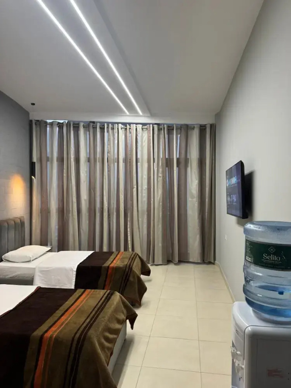 Hotel Gjuta - Chambres