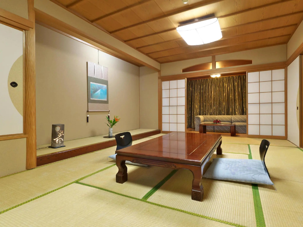 Yuraku Hotel - Chambres