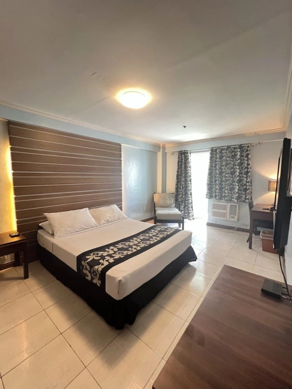 Jupiter Suites - Chambres