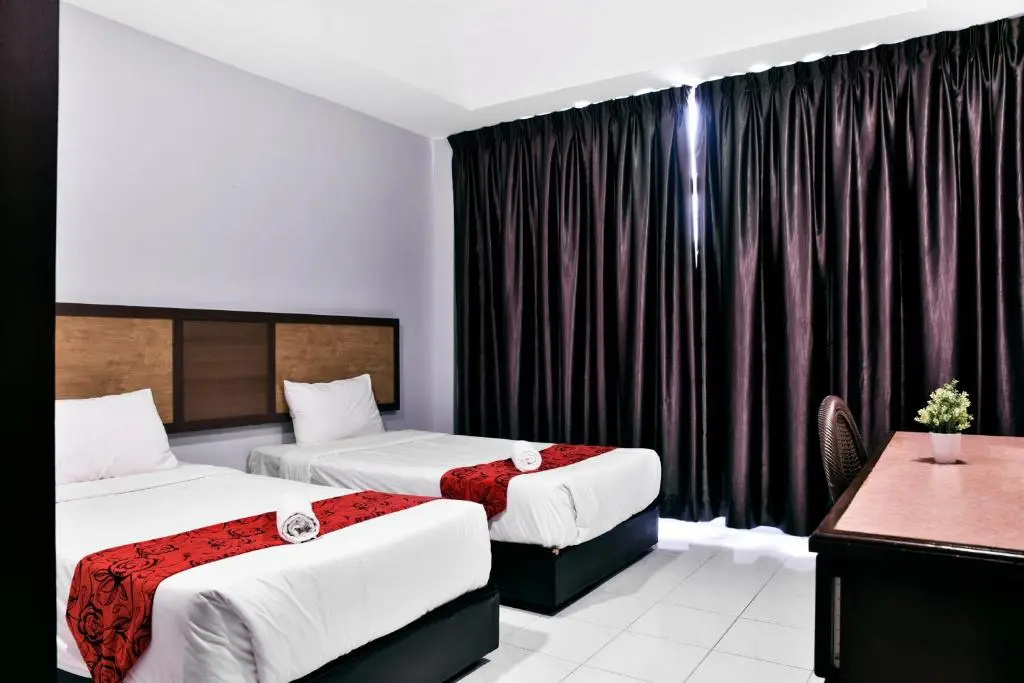Leisure Cove Hotel & Apartments - Chambres