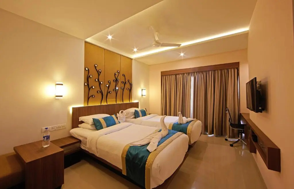 Saravana's Golden Fruits Business Suites - Chambres