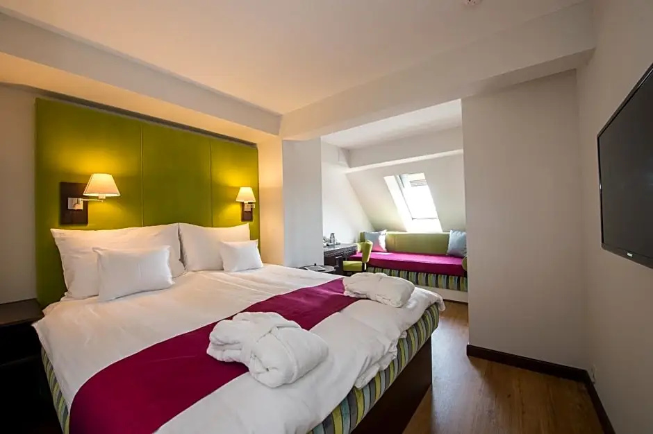 Three Corners Hotel Art - Chambres