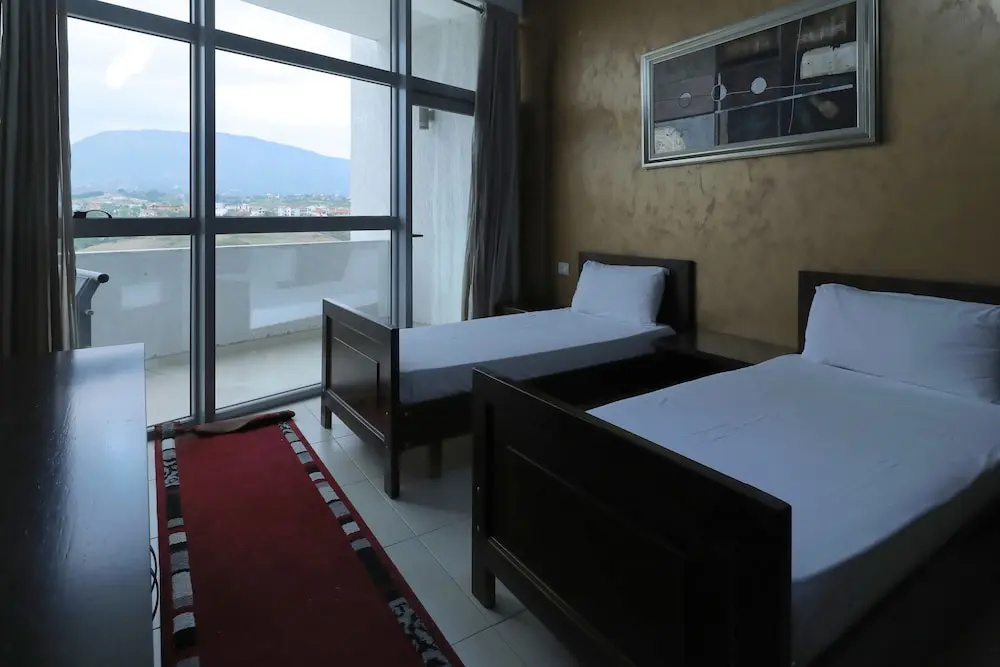 Hotel Gjuta - Chambres