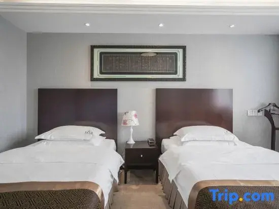 Guilong Hotel - Chambres