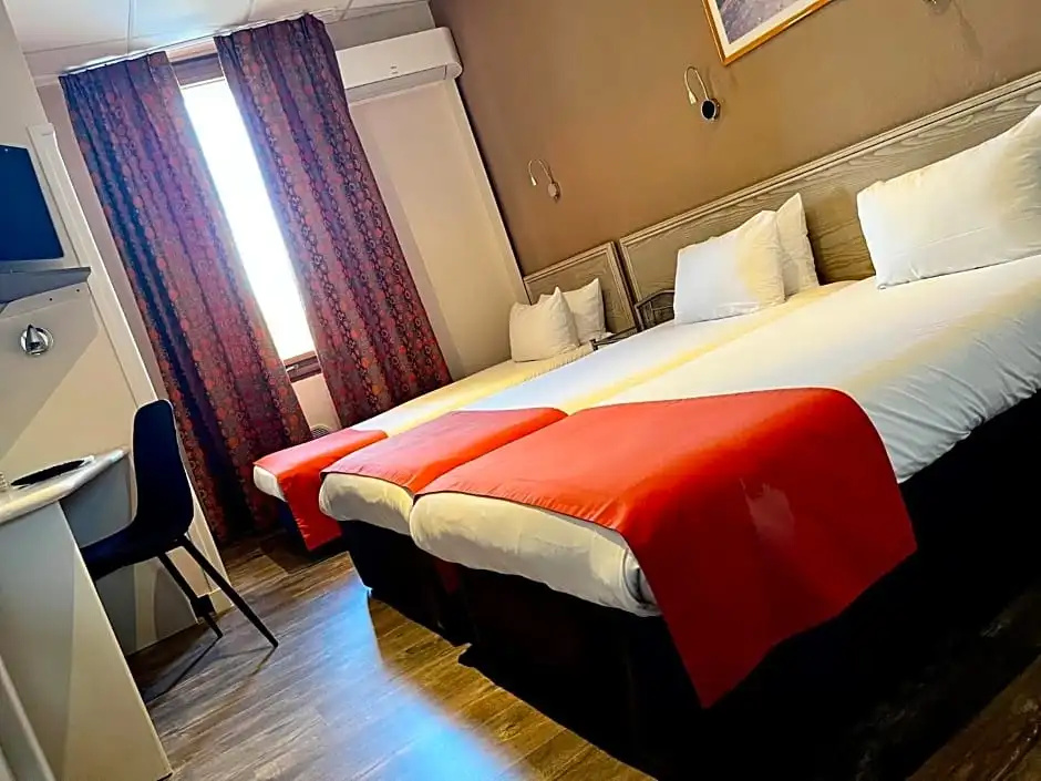 Cit'Hotel Le Louvre - Chambres