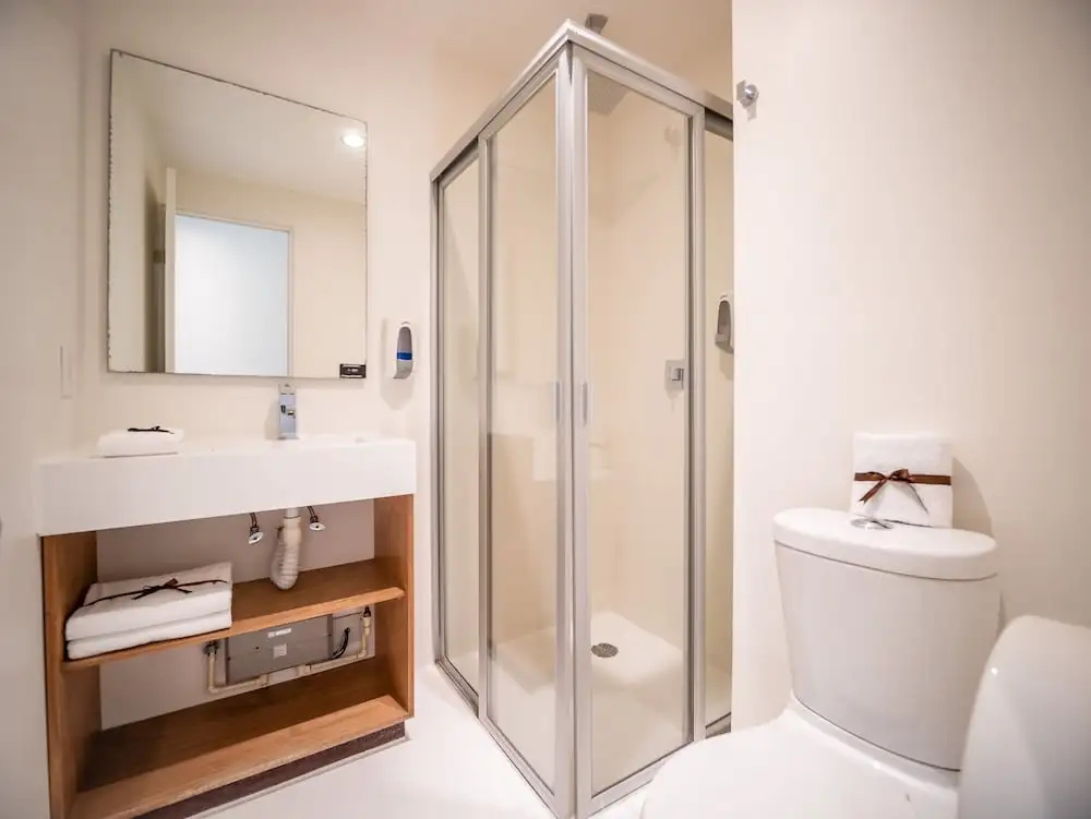 AM Hotel & Plaza - Chambres