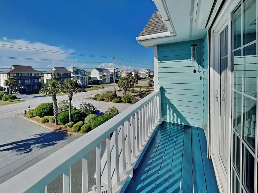 Blue Me A Wave by Topsail Realty
