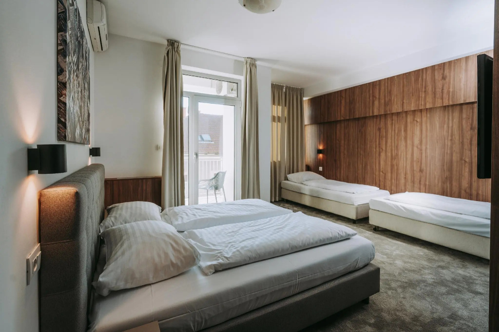 Standard Quadruple Family room with balcony