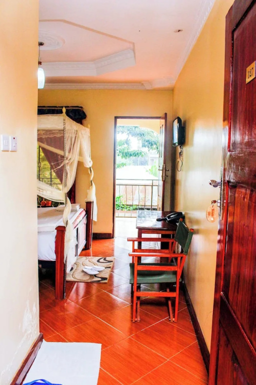Deluxe Double room with balcony and with garden view (full double bed)