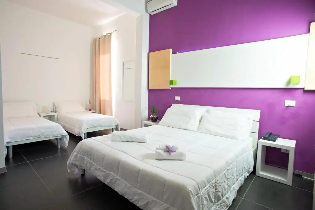 Standard Quadruple room with garden view