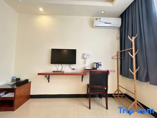 Huajun Hotel - Chambres