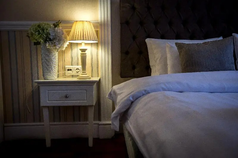 Queen's Court Hotel & Residence - Chambres