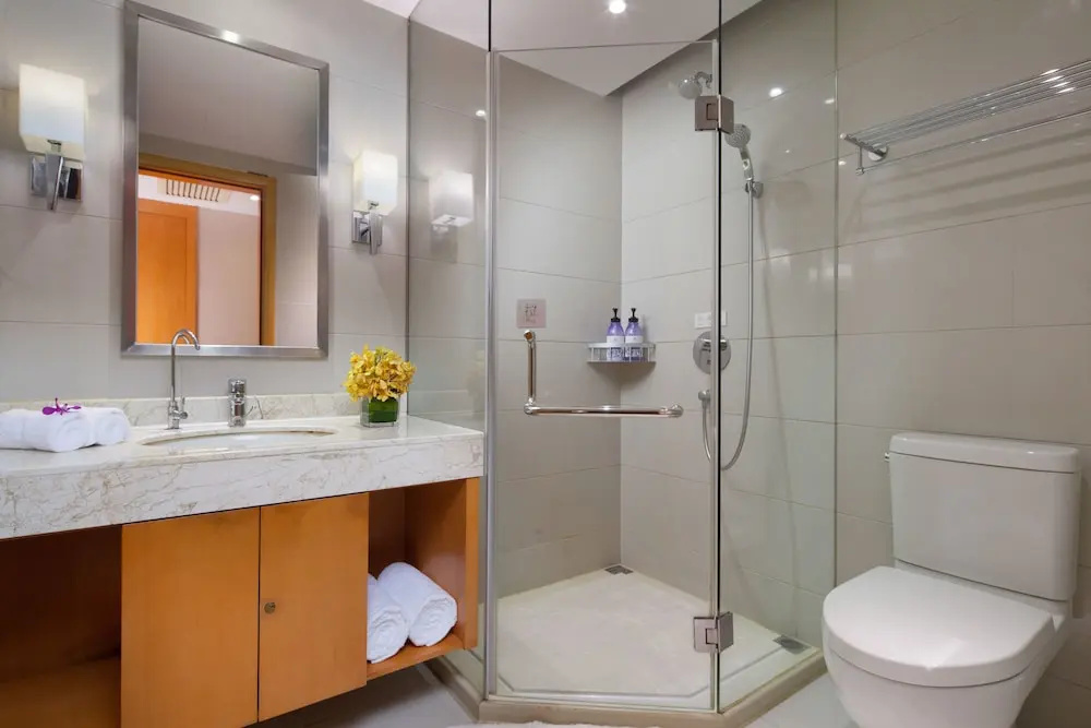 Huachen International Hotel - Chambres