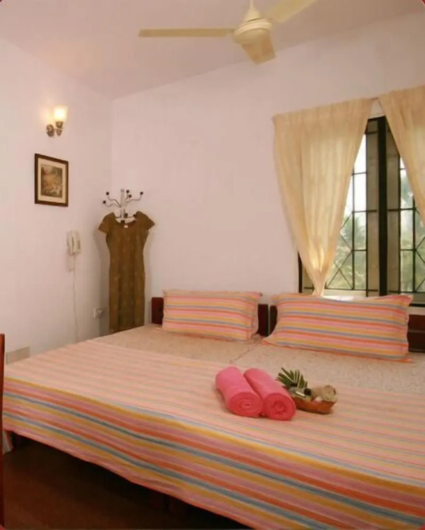 豪華雙人房，設有露台及雙人床