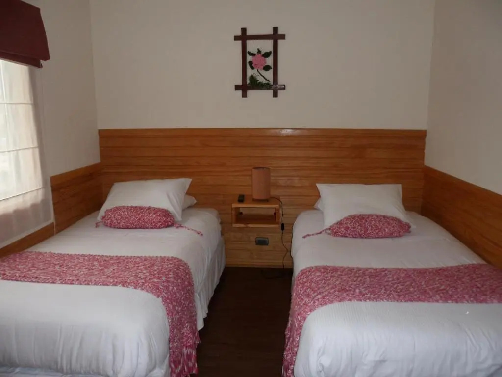 Hotel y Departamentos Dein Haus - Chambres