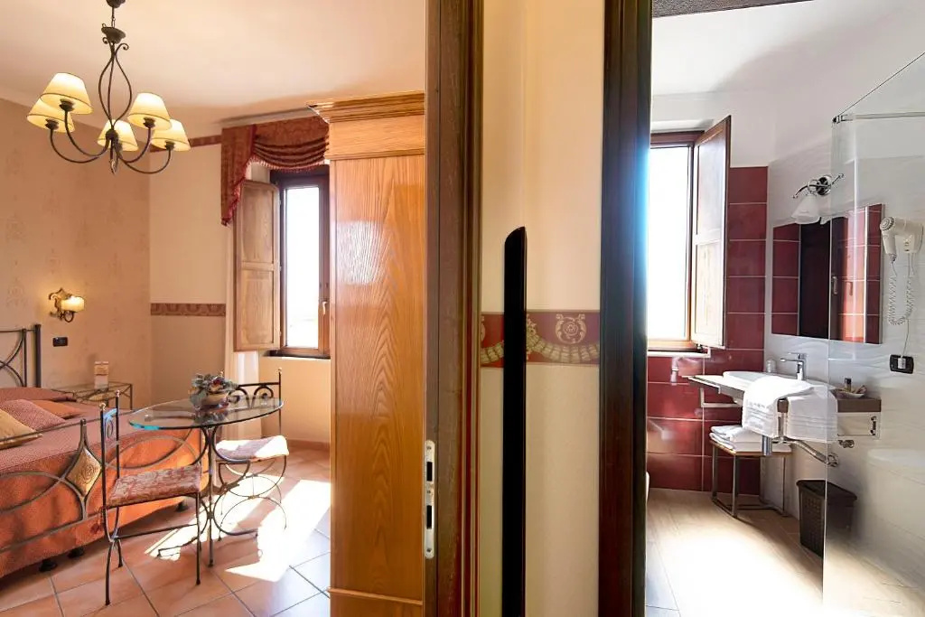 Pinto Storey Hotel - Chambres