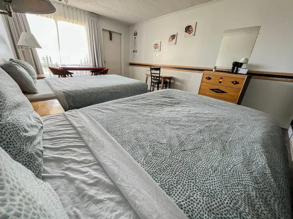 Economy Quadruple room with river view (2 full double beds)