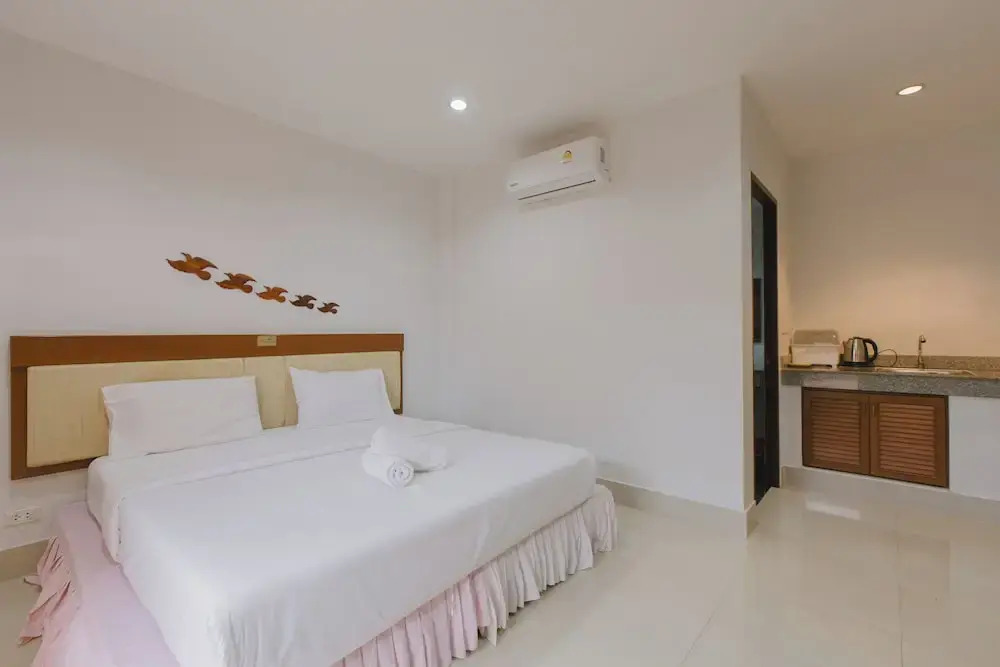 Двухместная студия с балконом двуспальная кровать в Kataonsea Bungalows